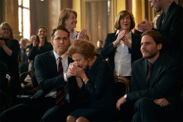 (L-R) RYAN REYNOLDS, HELEN MIRREN, and DANIEL BRUHL star in WOMAN IN GOLD
